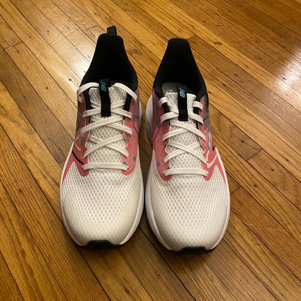 White and Pink Athletic Shoes
